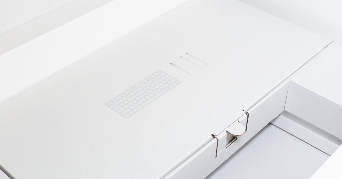 Clean and minimalist white packaging design for electronics item.