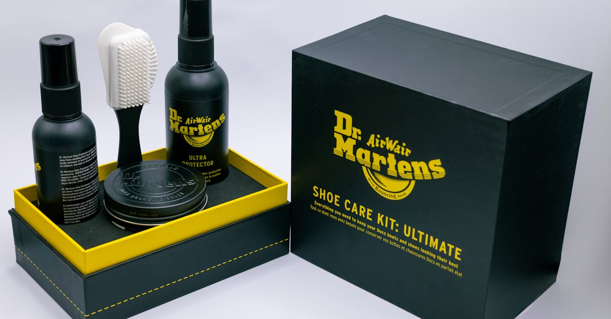 Ultimate Dr. Martens shoe care kit including protector, brush, and wax for leather maintenance.