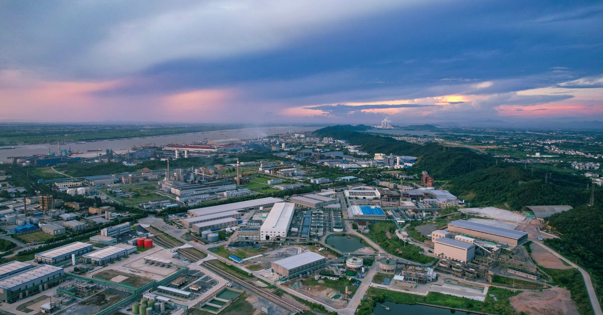 A stunning aerial view of an industrial area at sunset in Jiujiang, China.