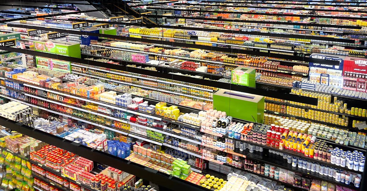Aerial view of supermarket aisles filled with colorful products and packaging.