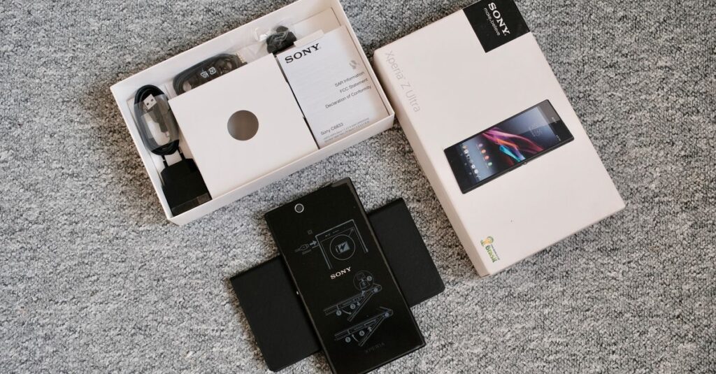 Detailed unboxing image of a mobile phone and its accessories, perfect for tech blogs.