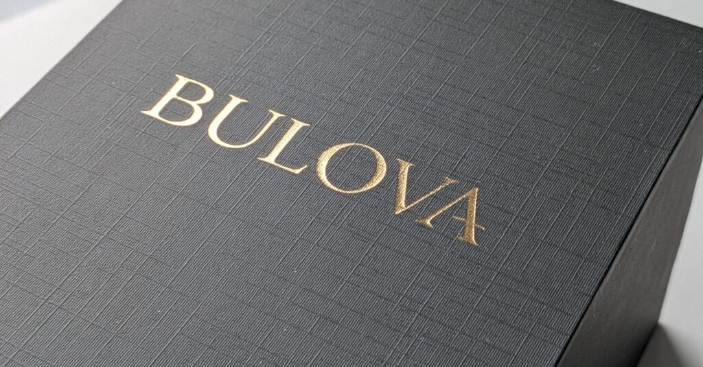 Sophisticated Bulova gift box with textured design, captured in natural daylight.
