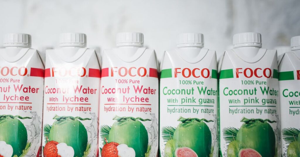 Assorted coconut water bottles with lychee and pink guava flavors for a refreshing taste experience.