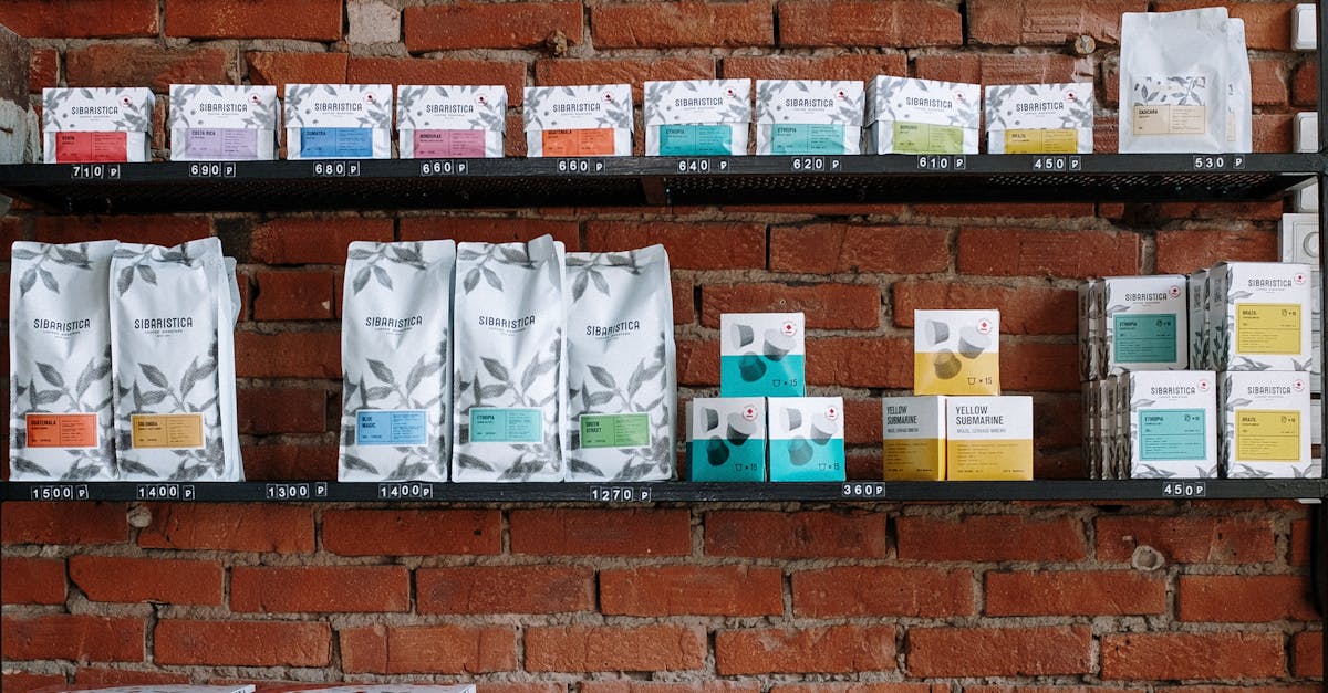 Brick wall shelving in a café with various coffee products and modern decor.
