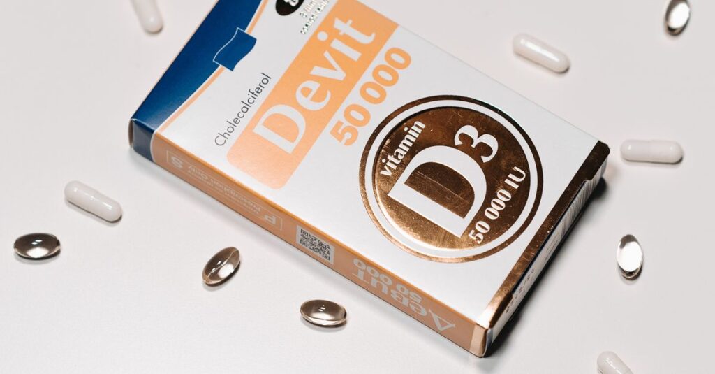 Vitamin D3 50000 IU supplement box surrounded by capsules on a white background.