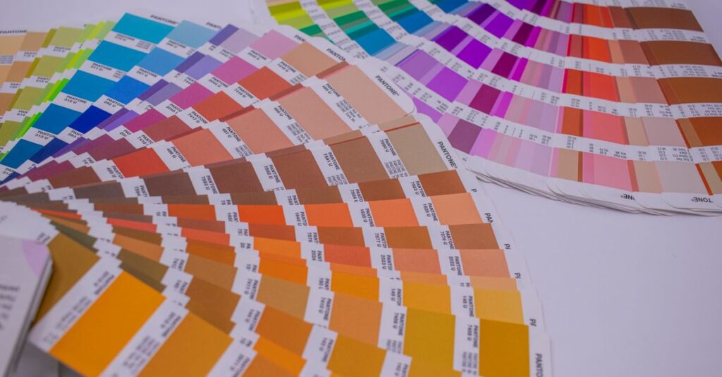 A collection of Pantone color swatches showcasing a wide range of vivid hues for designers.