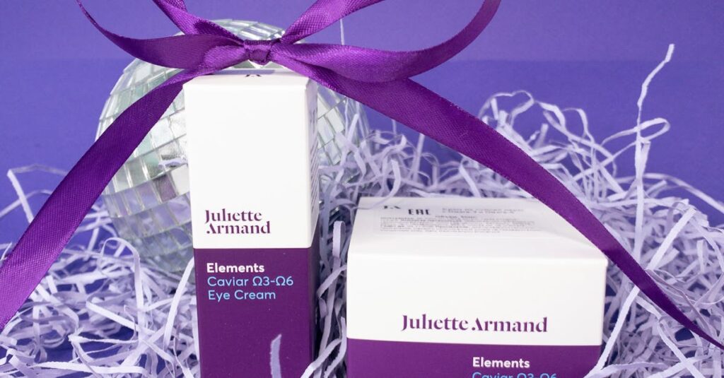 Skincare products elegantly packaged with a purple bow and festive background. Ideal for gift-giving.