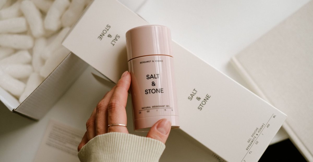 Elegant skincare packaging showcasing Salt & Stone deodorant with a cozy, minimal aesthetic.
